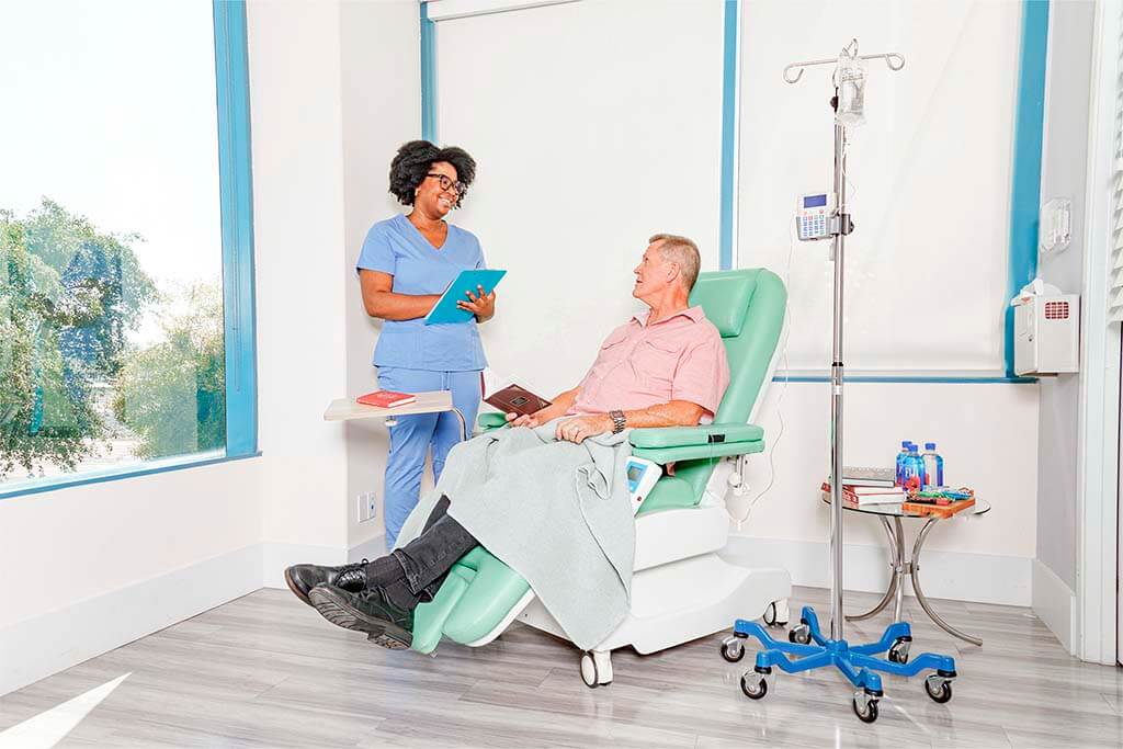IV therapy nurse in London preparing mobile drip session
